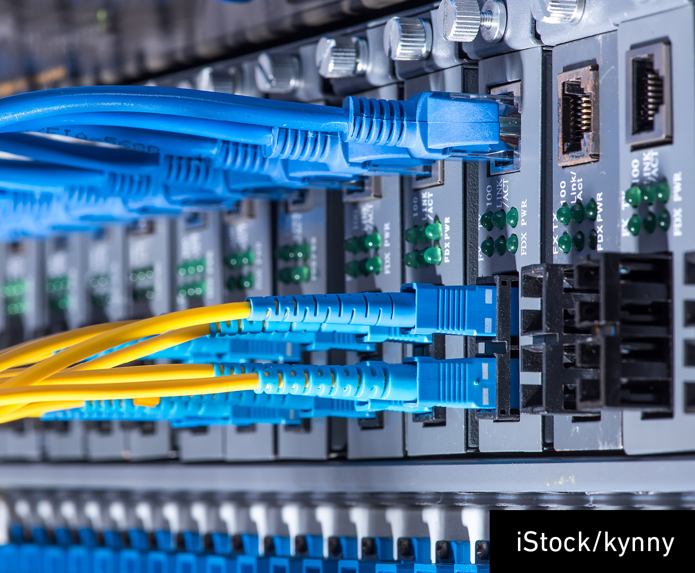 Fiber Optic cables and UTP Network cables stock photo
